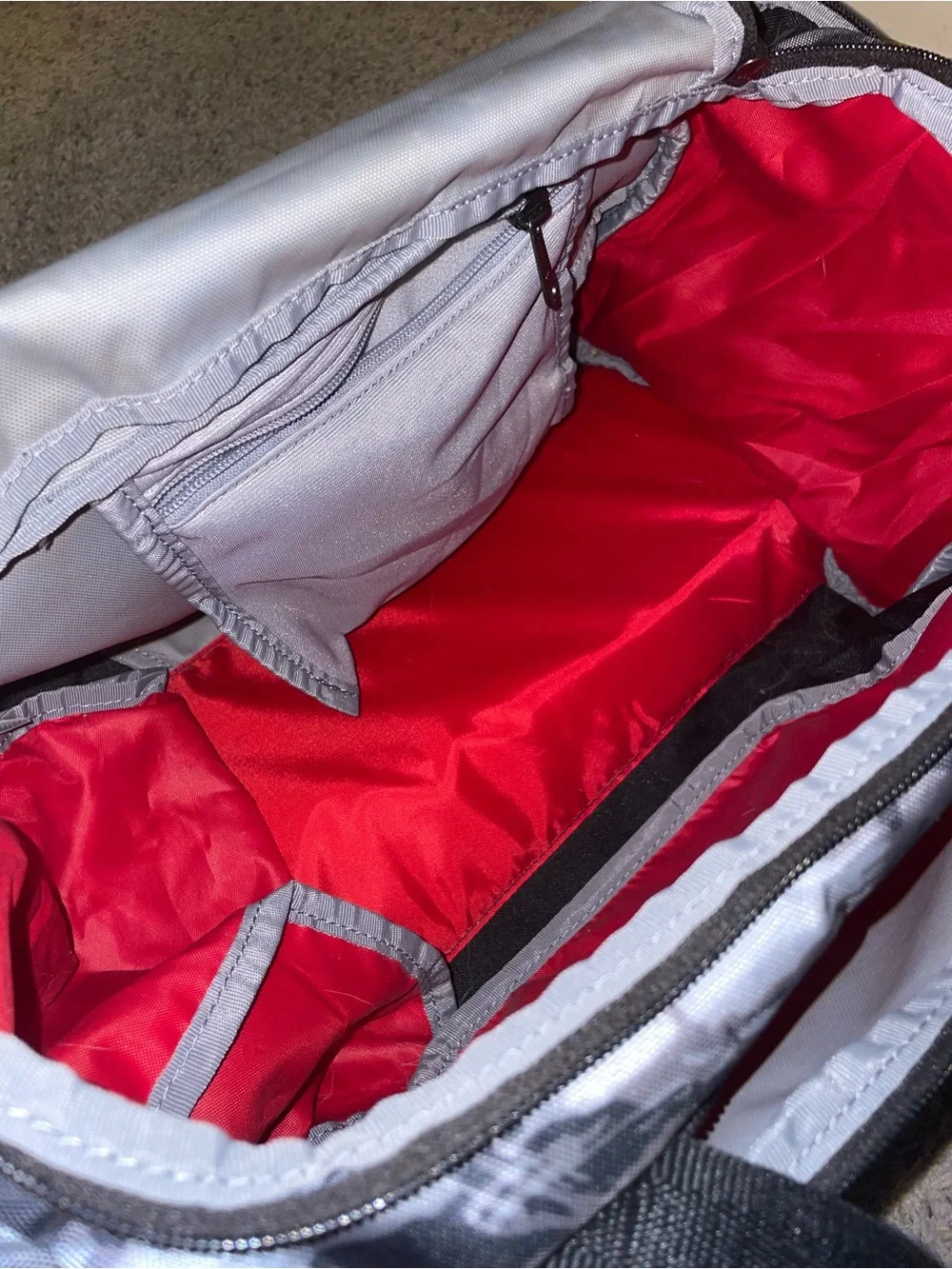 Under Armour Men’s Gray Camo Duffel Bag with Red Logo